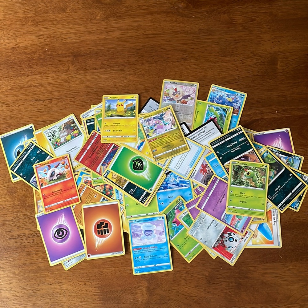 139 Pokemon cards with metal case. 127 cards and 12 code cards.